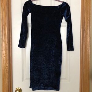Swade dark blue off shoulder chocked neck dress.